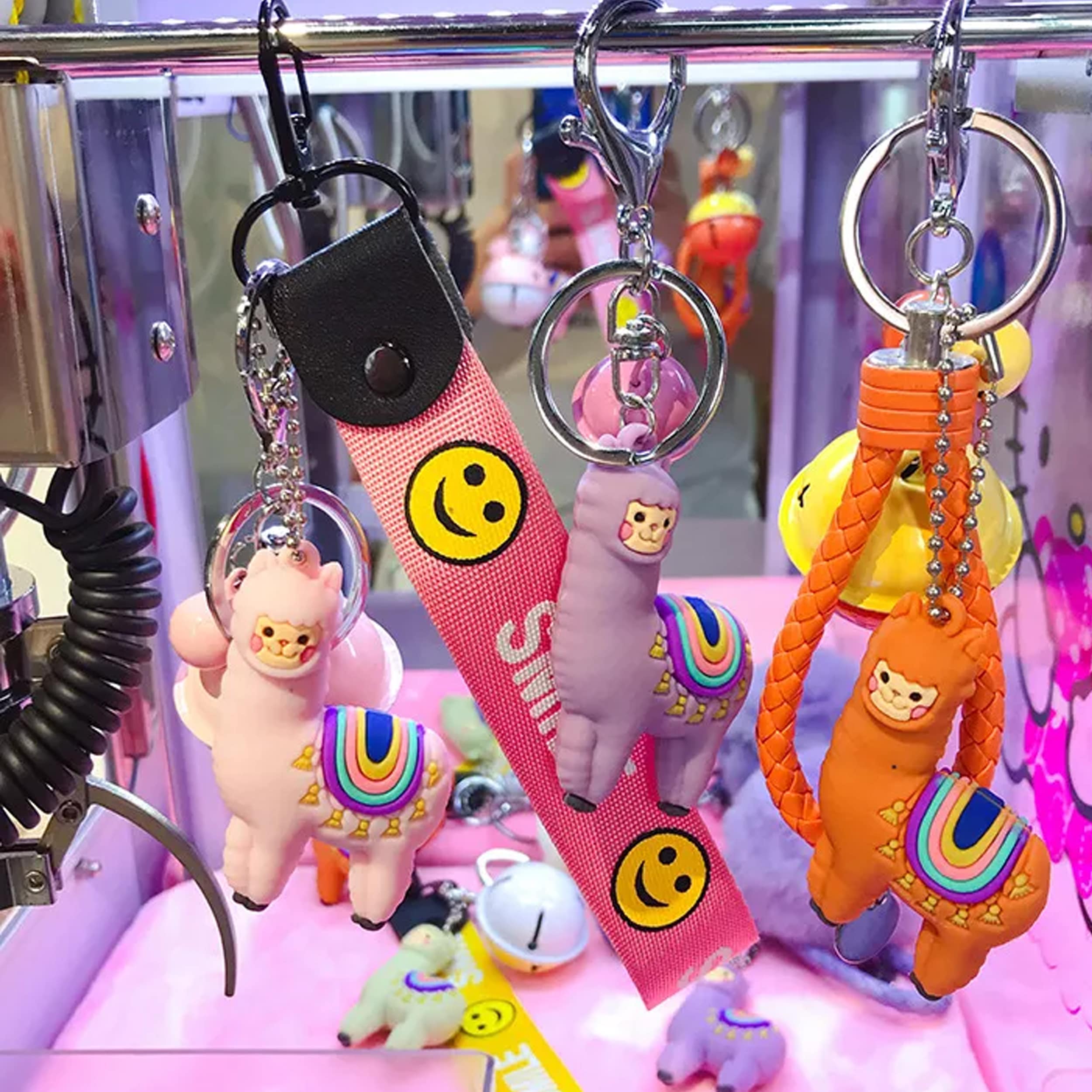 3 Lama keychain with bell hanging on a rod