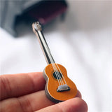 Figurines 1:12 Dollhouse Miniature Mini Classic Guitar Model Toy Instrument for Home Decoration Wood Craft Kids Gifts