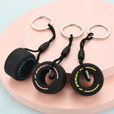 D2407GG Luxury Mini F1 Racing Tire Keychain Car Key Accessories PVC Tyre Pendant Bag Charm Men's Gadgets Gifts For Friends Car Lovers