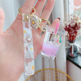 Liquid Floating Bottle Keyring -(Sold By Dozen =$39.99)