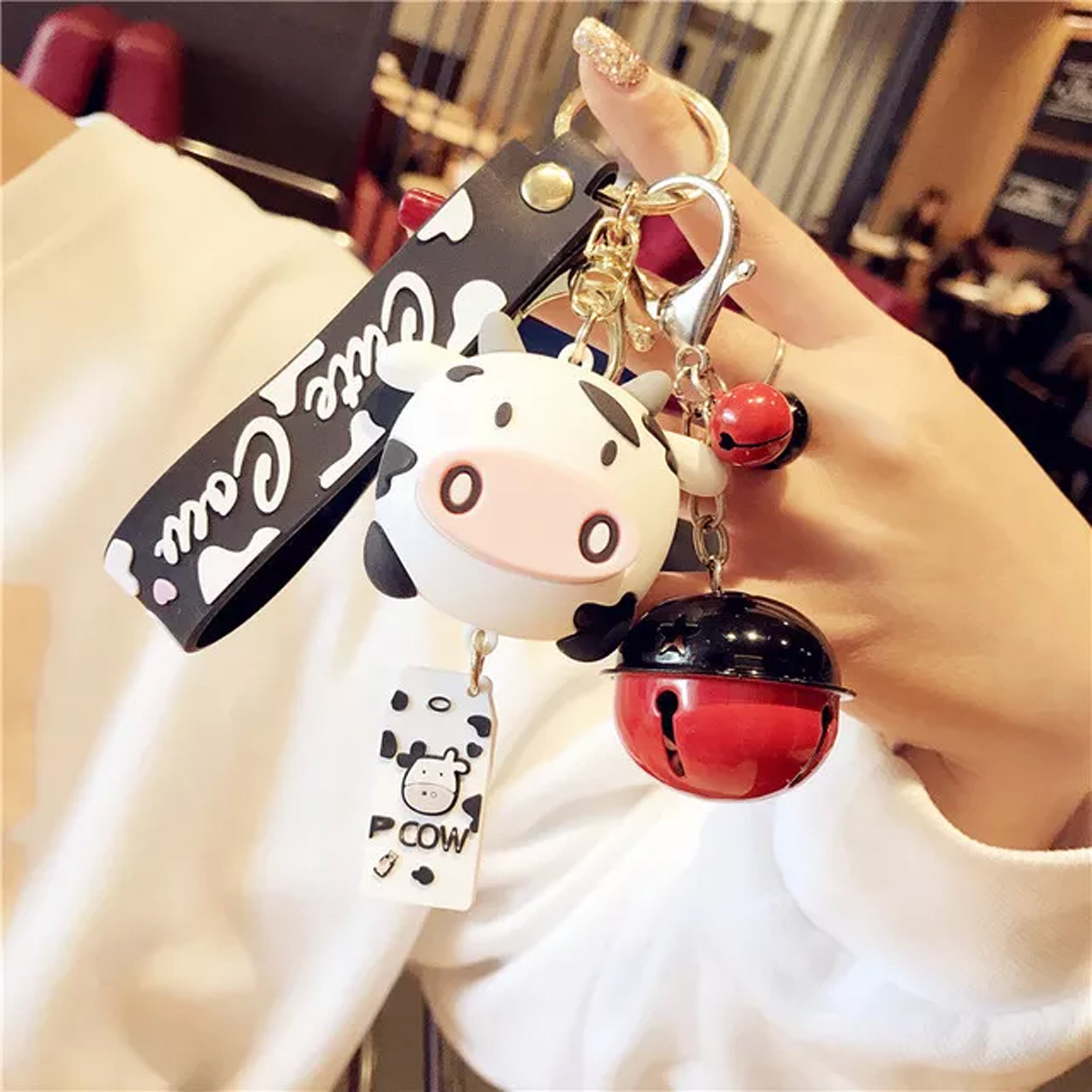 Cow keychain with bell