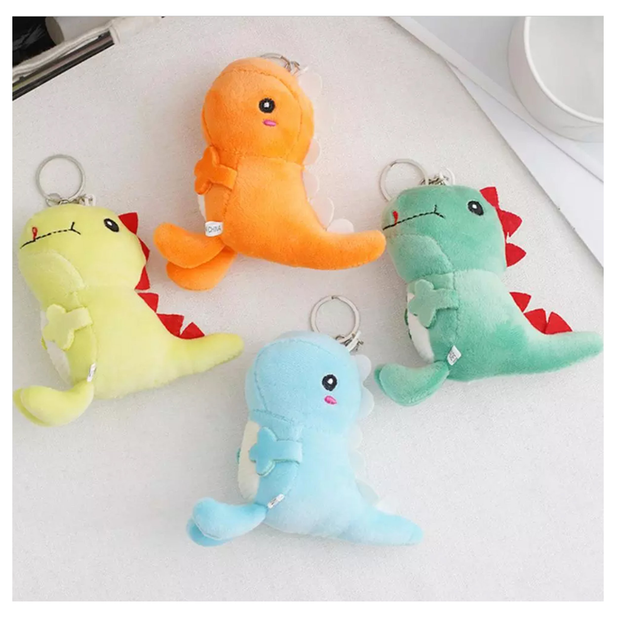 Bring Your Favorite Dinosaur Everywhere with Our Stuffed Animal Soft Toy Keychain - Assorted Colors