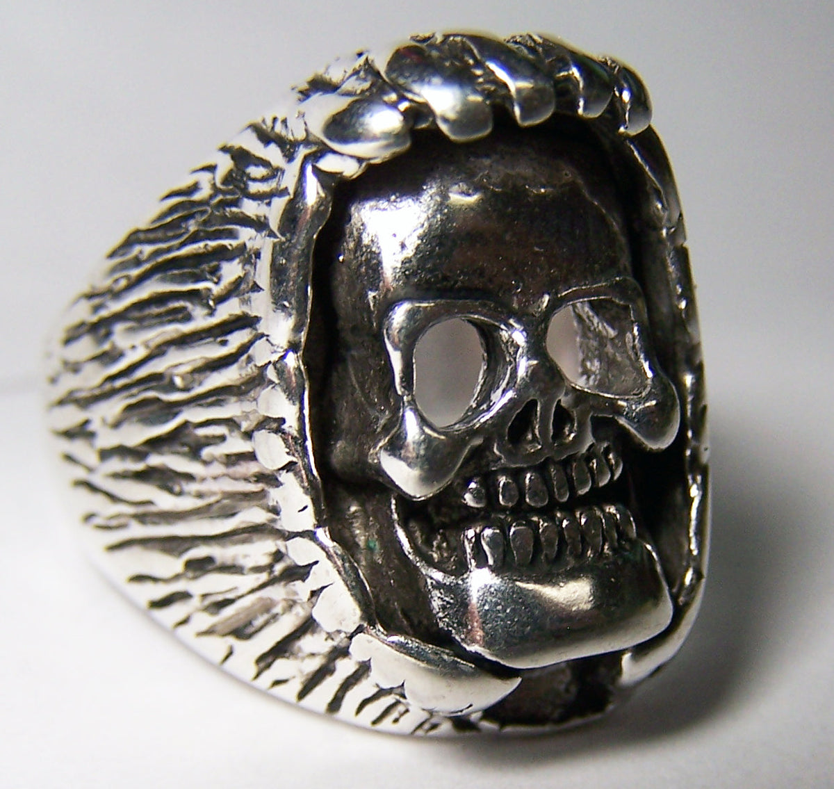 Wholesale HAND OVER SMILING SKULL HEAD BIKER RING  (Sold by the piece) *