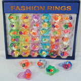 Wholesale FLOWER FILLED LUCITE RINGS (Sold by the dozen) *- CLOSEOUT NOW ONLY 25 CENT EA