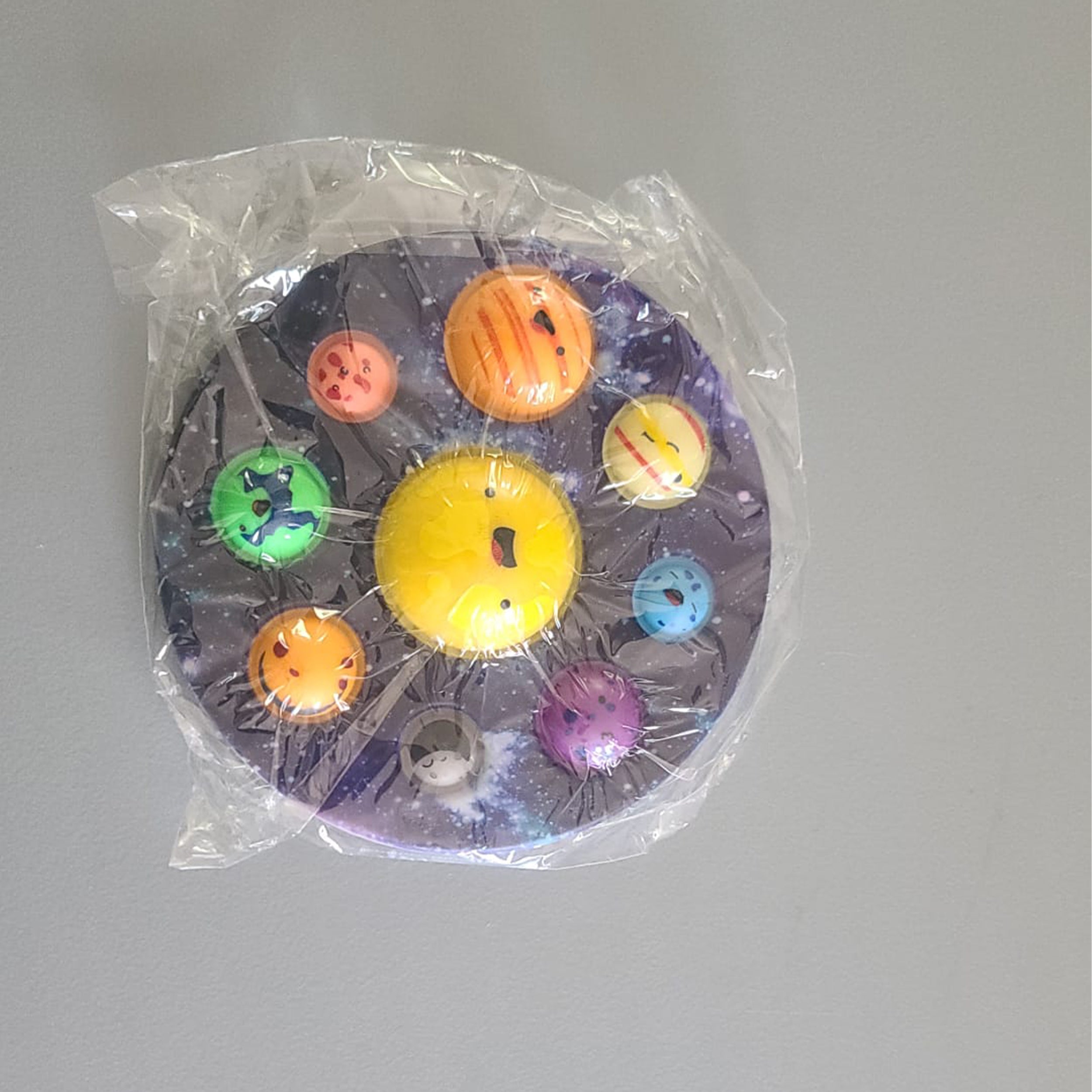 Packing Image Of Simple Dimple Planet Pop It Fidget Toy