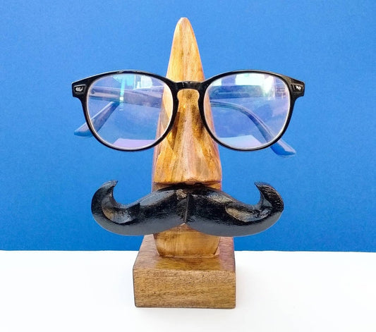 Keep your glasses safe and stylish with the Handcrafted Wooden Nose Shaped Spectacle Holder