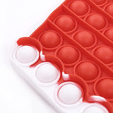 Close up view of Red Santa Gloves Pop it Fidget Toys